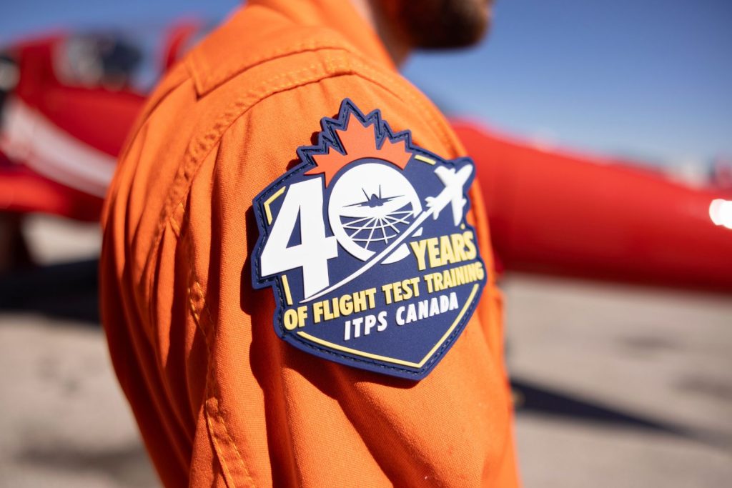 ITPS Canada 40th year patch on orange flight suit